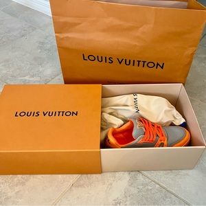 Louis Vuitton’s mens LV TRAINER AUTHENTIC ORANGE. SOLD OUT EVERYWHERE.